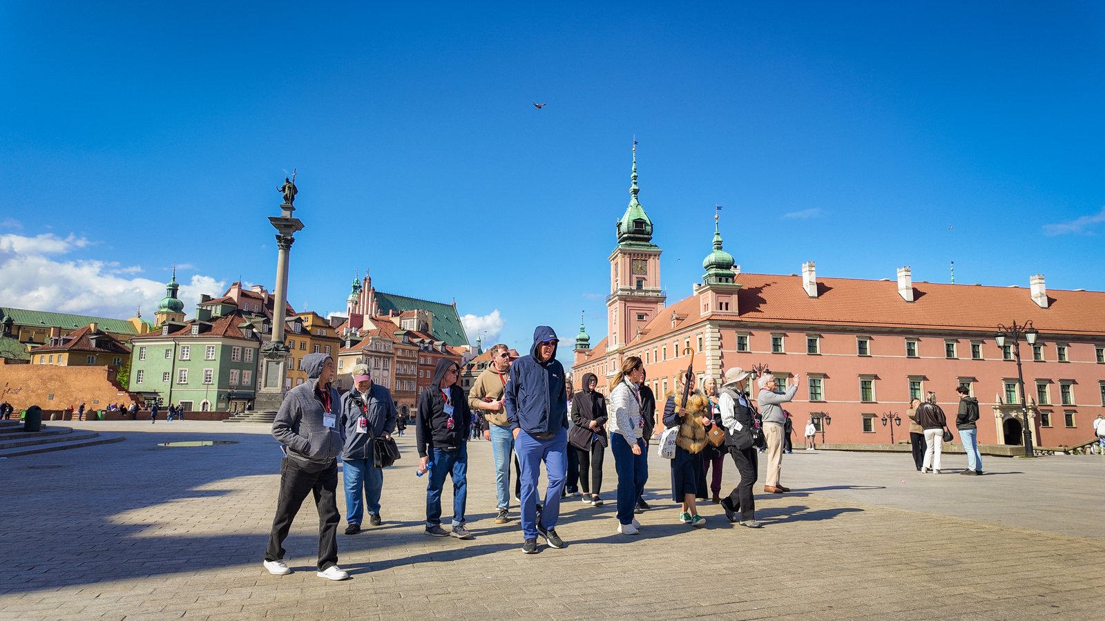 Group of travelers hiking through scenic mountains